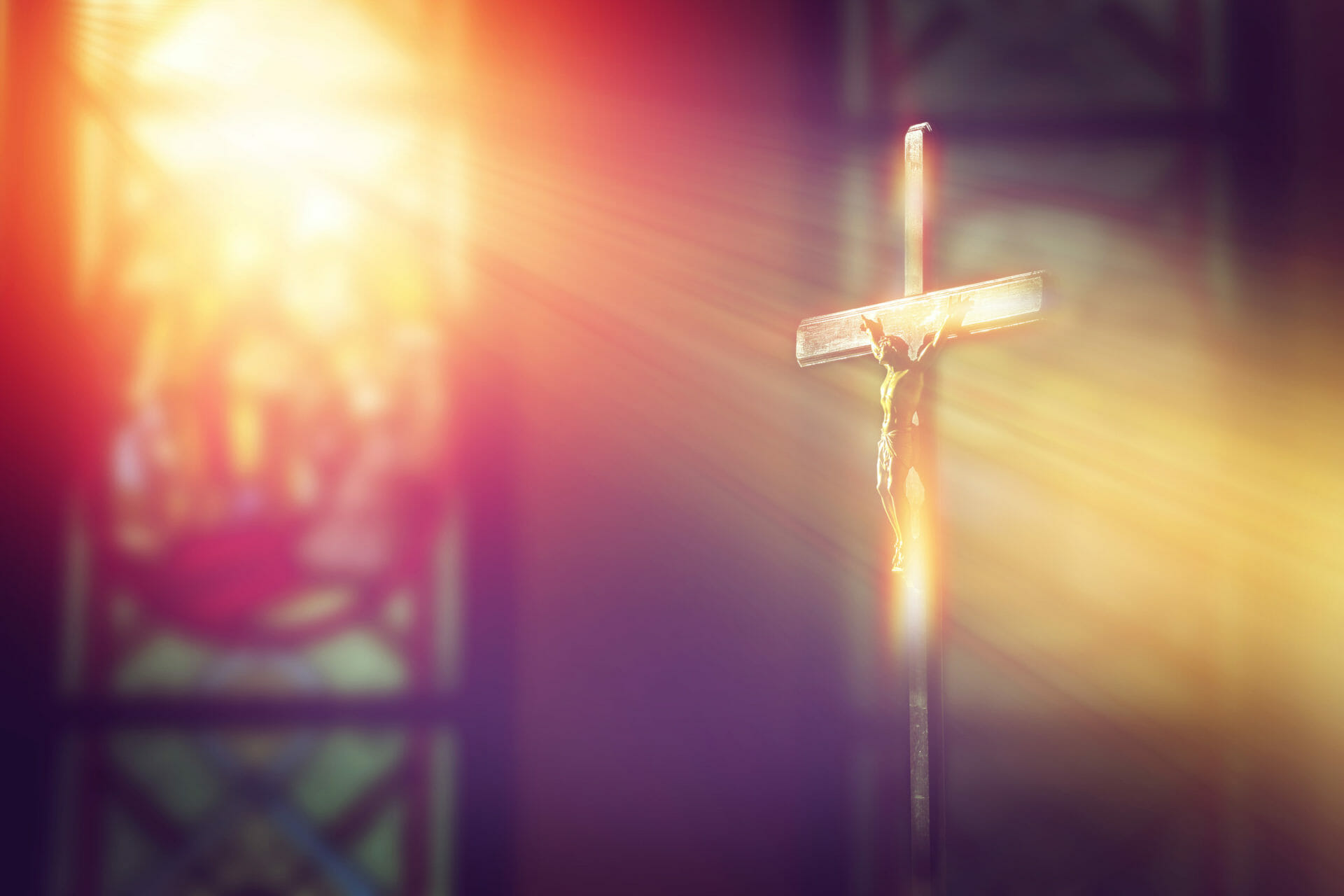 crucifix-jesus-cross-church-with-ray-light-from-stained-glass